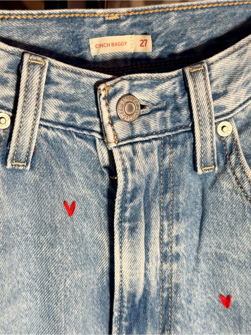 Levi's Light Blue Wide-Leg Jeans with Small Red Heart Details